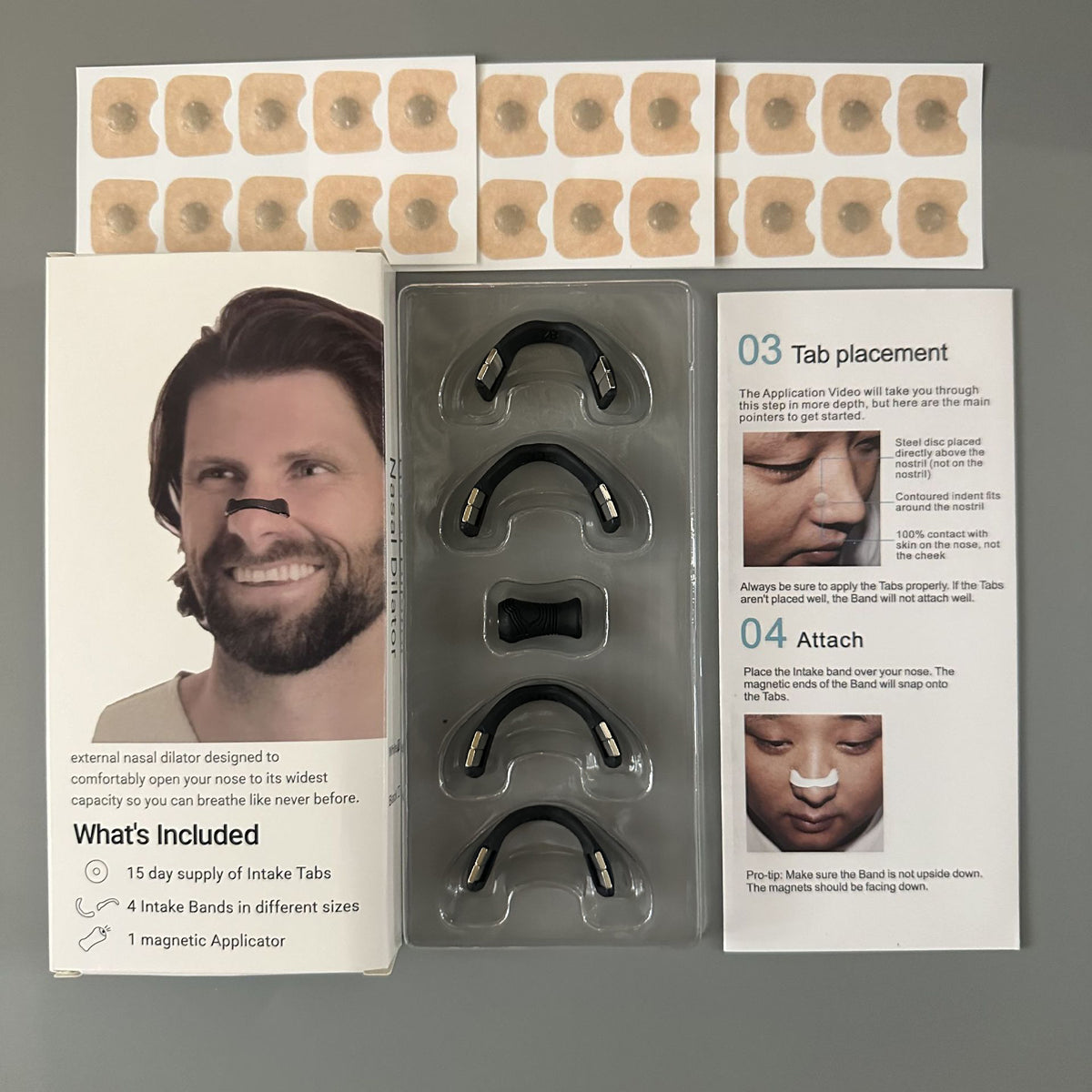 Kit contents laid out: tab sheets, 4 magnetic bands and the instruction card