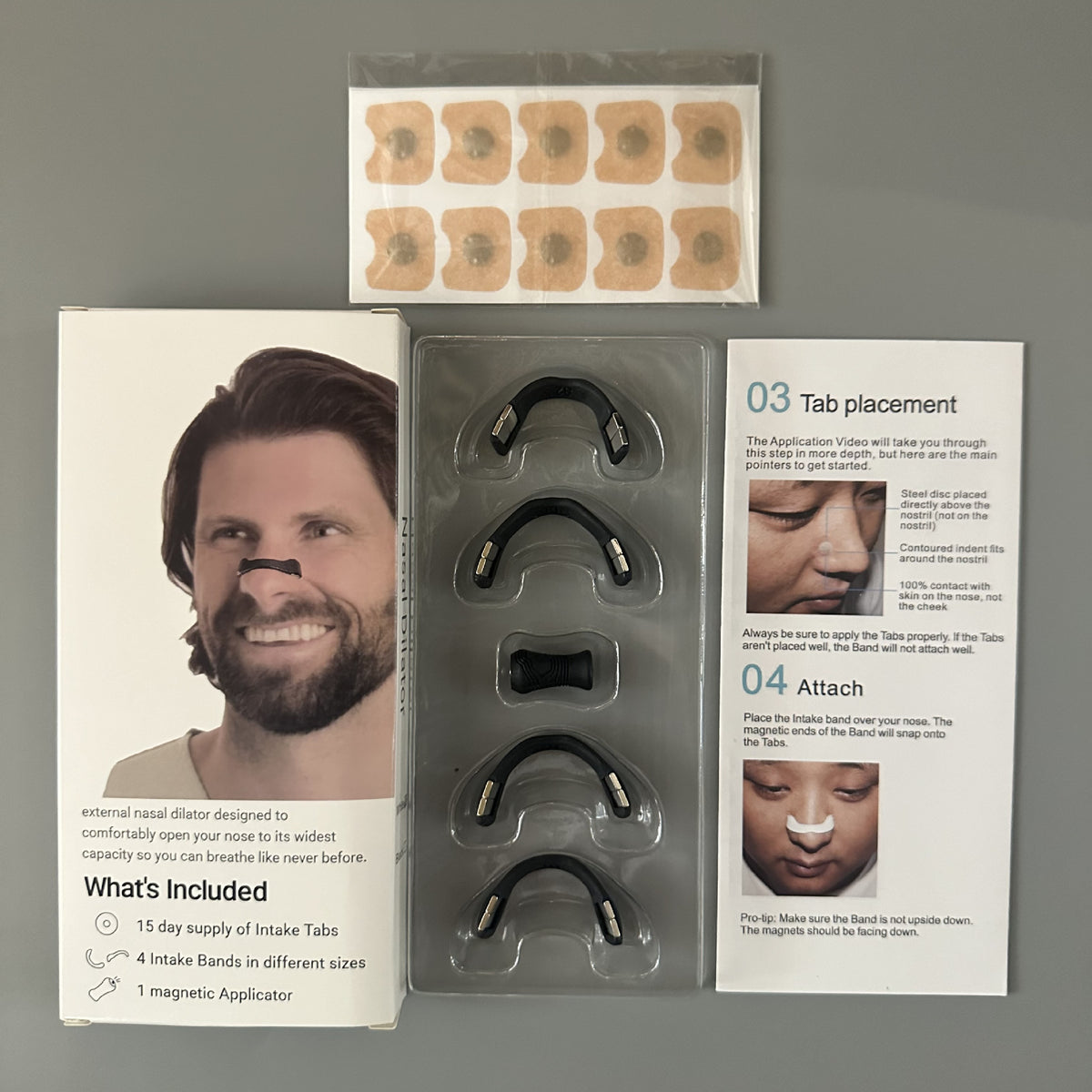 Starter kit contents: adhesive tabs, 4 black magnetic bands and the instruction card
