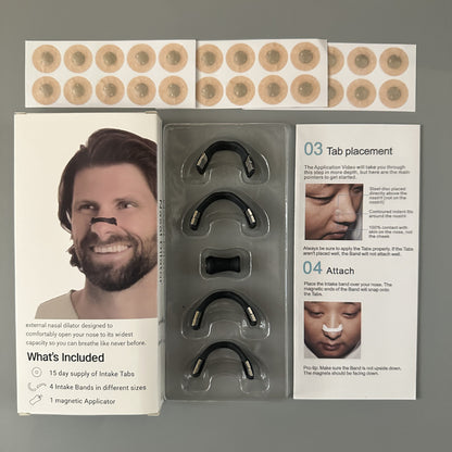 Kit contents with black magnetic bands in 4 sizes and sheets of adhesive tabs